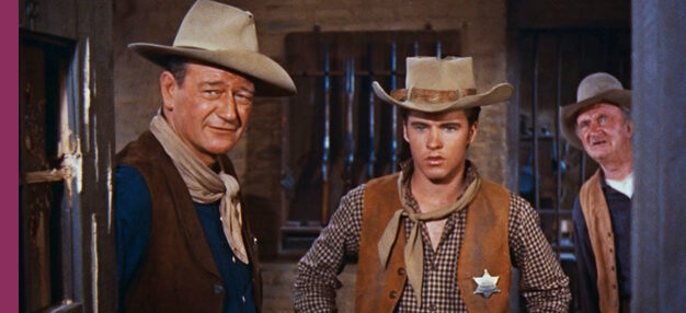 John Wayne et deux autres personnages dans une armurerie, Rio Bravo